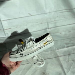 The original surf sider White vans with palm tree details and yellow soles. US 7